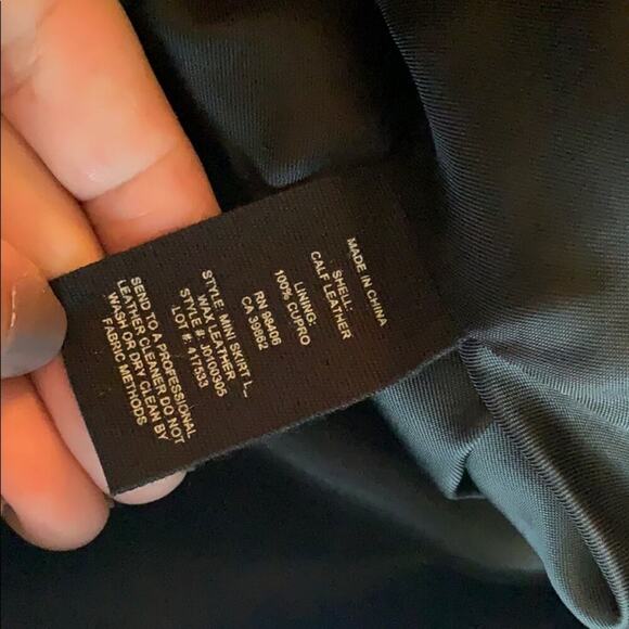 Theory Leather Wax Mini Skirt in Black. - Picture 7 of 7